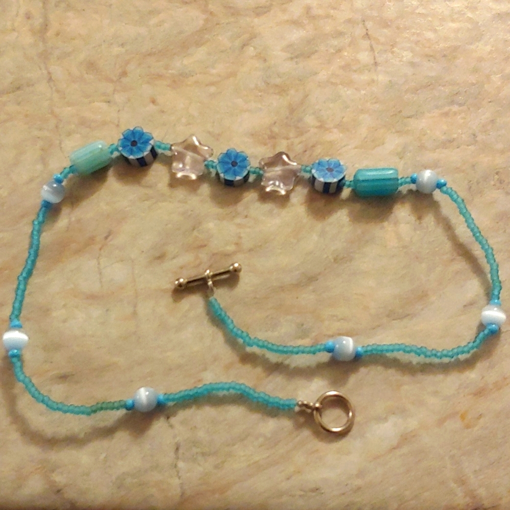 Beaded choker.